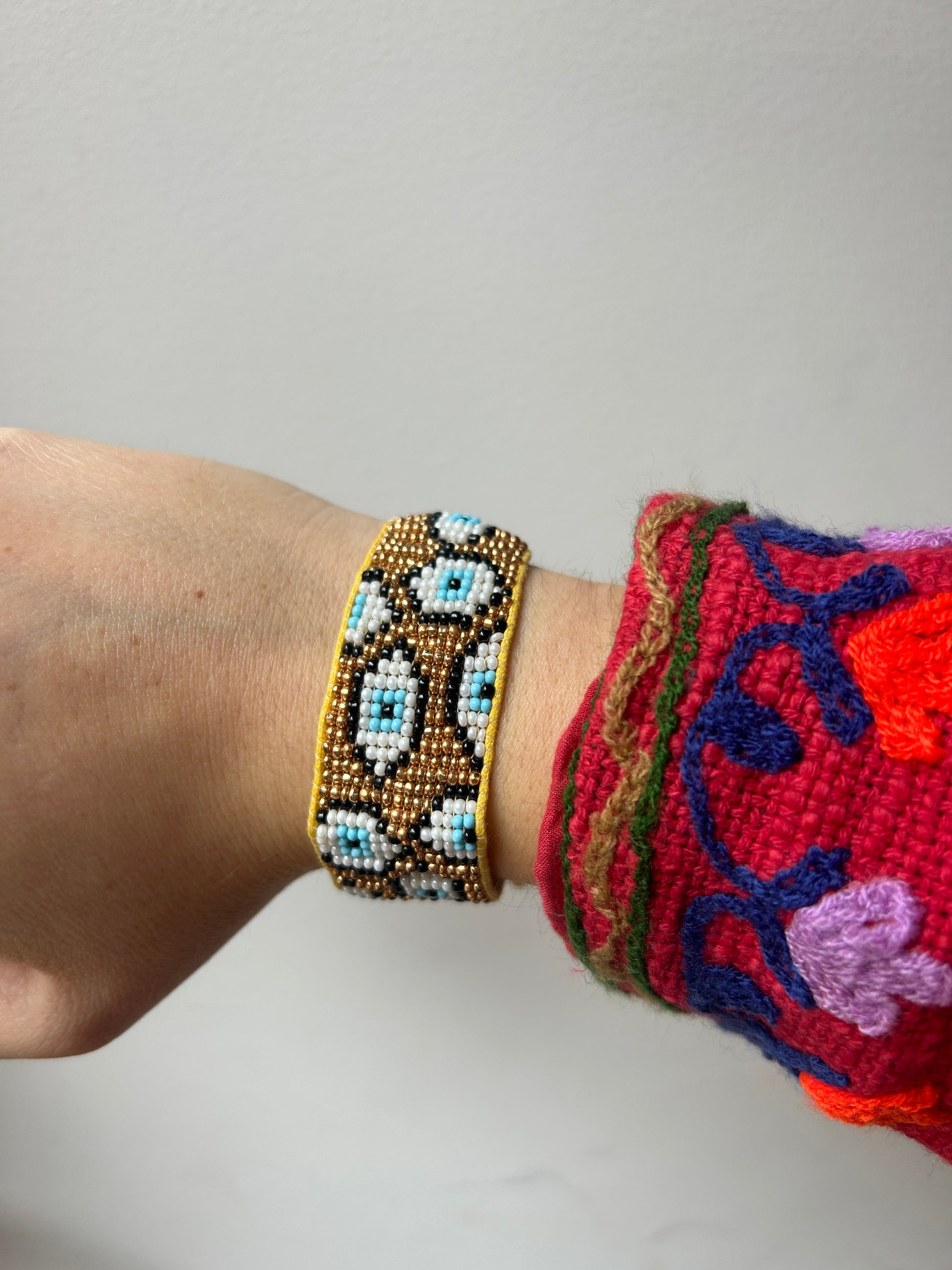 Bracelet femme en Perles little eyes doré