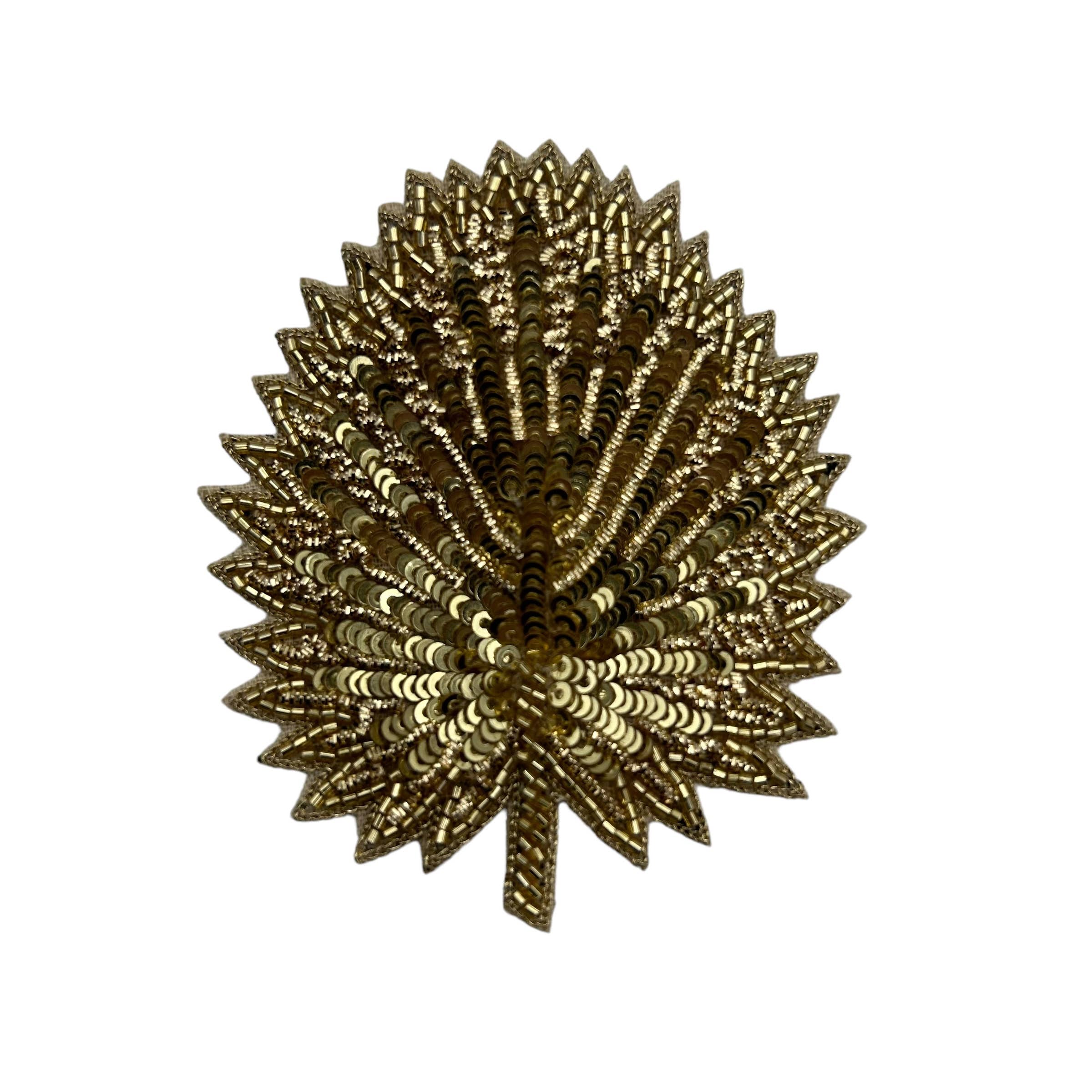 Broche palme dorée