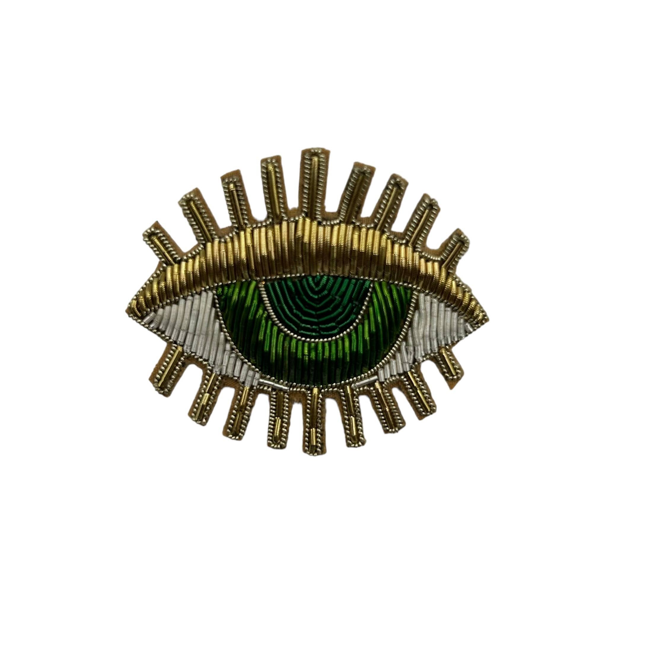 Broche evil eyes